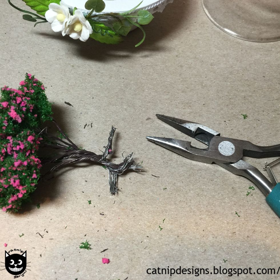 Separate the wires into 4 even bundles, about a 1/2" long, and twist them into "roots".