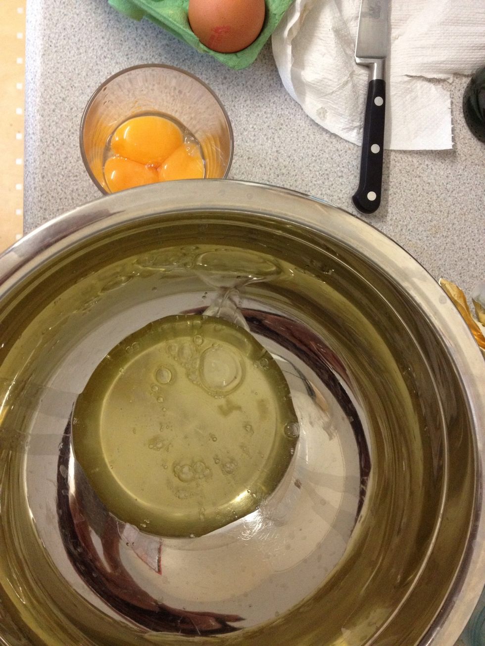 Separate your eggs. You will need both parts. Add the yolks to the choco/butter/sugar when it's cooled down a bit. Now also sift in the flour.