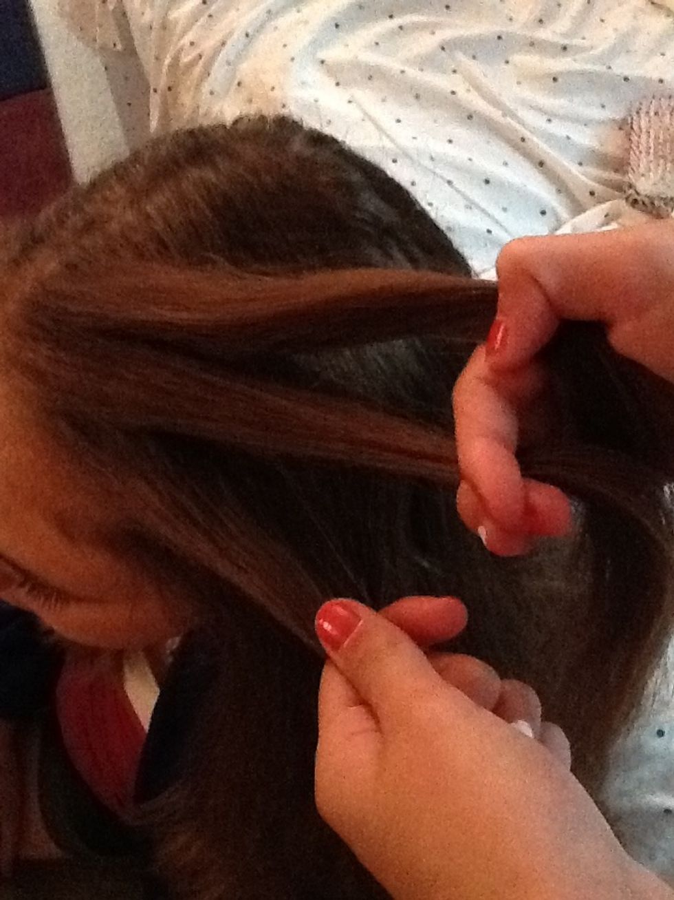 Separate your hair into three sections