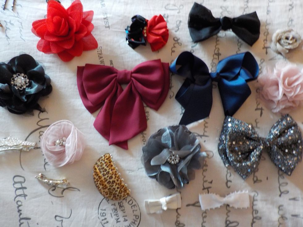 Separate your hair items into two separate piles. One for larger items like bows and flowers and one for smaller items like clips.