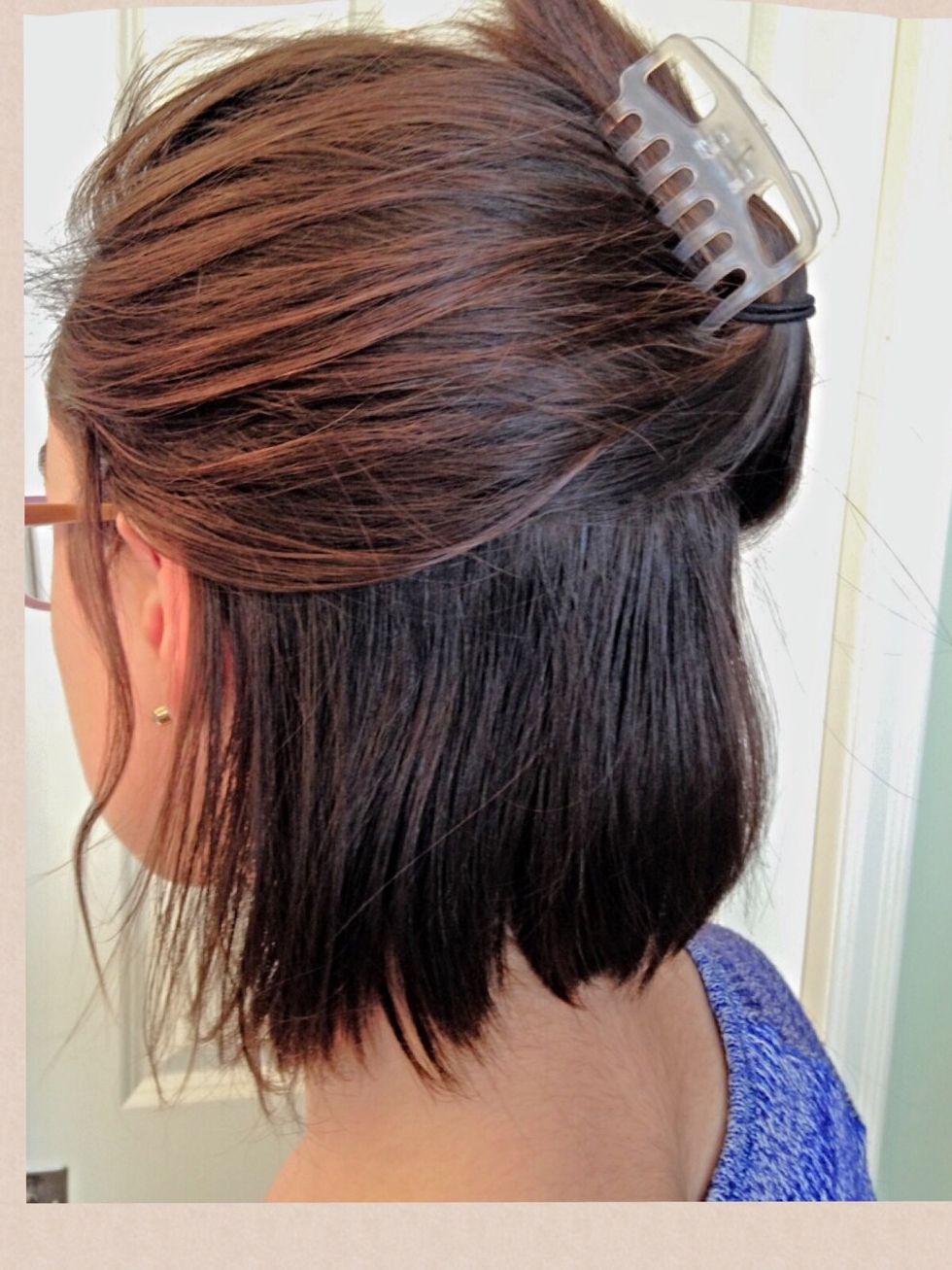 Separate your hair so it is divided between top and bottom like this.