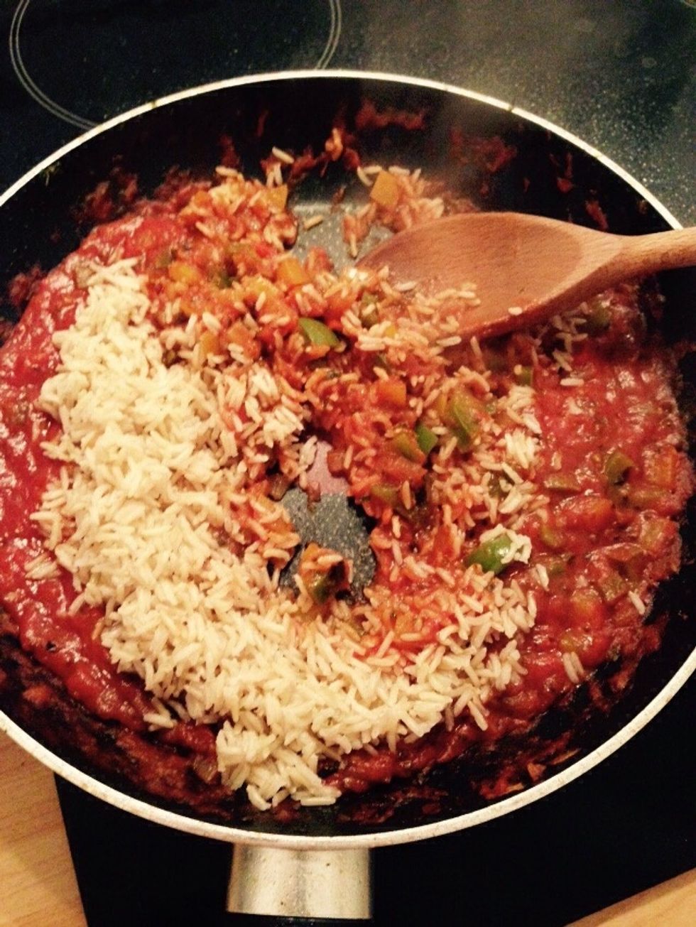 Separately cook the rice, I am using organic brown basmati, but you can use whatever you want or just the variety of rice you have around the house. Just cook it until it's undercooked and stir it in