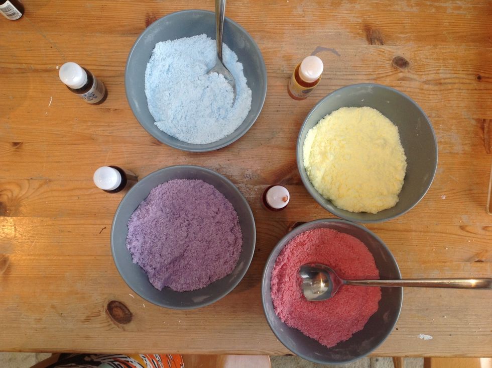 Seperate into four bowls and using different spoons for each colour mix the dye in drops and stir in quickly to avoid the mixture frothing up