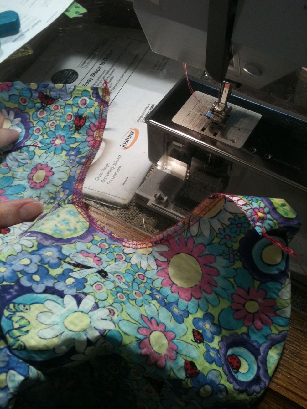 Serge or zig zag your raw armholes.
