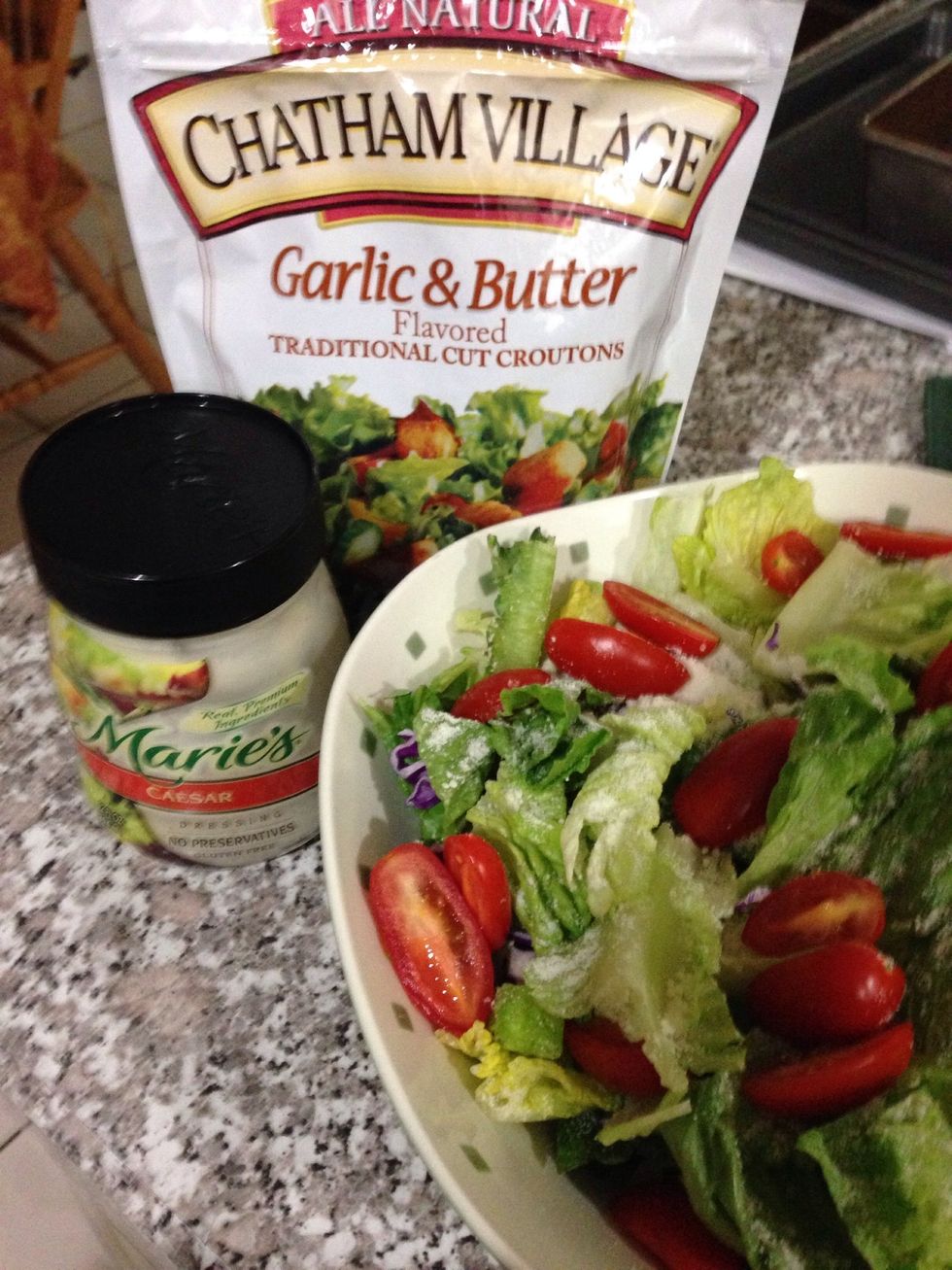 Serve a salad along side, I used a bag of Caesar salad, grated parm, cherry tomatoes, croutons and a premade Caesar dressing! You can use any lettuce you like and use a light vinaigrette if you prefer