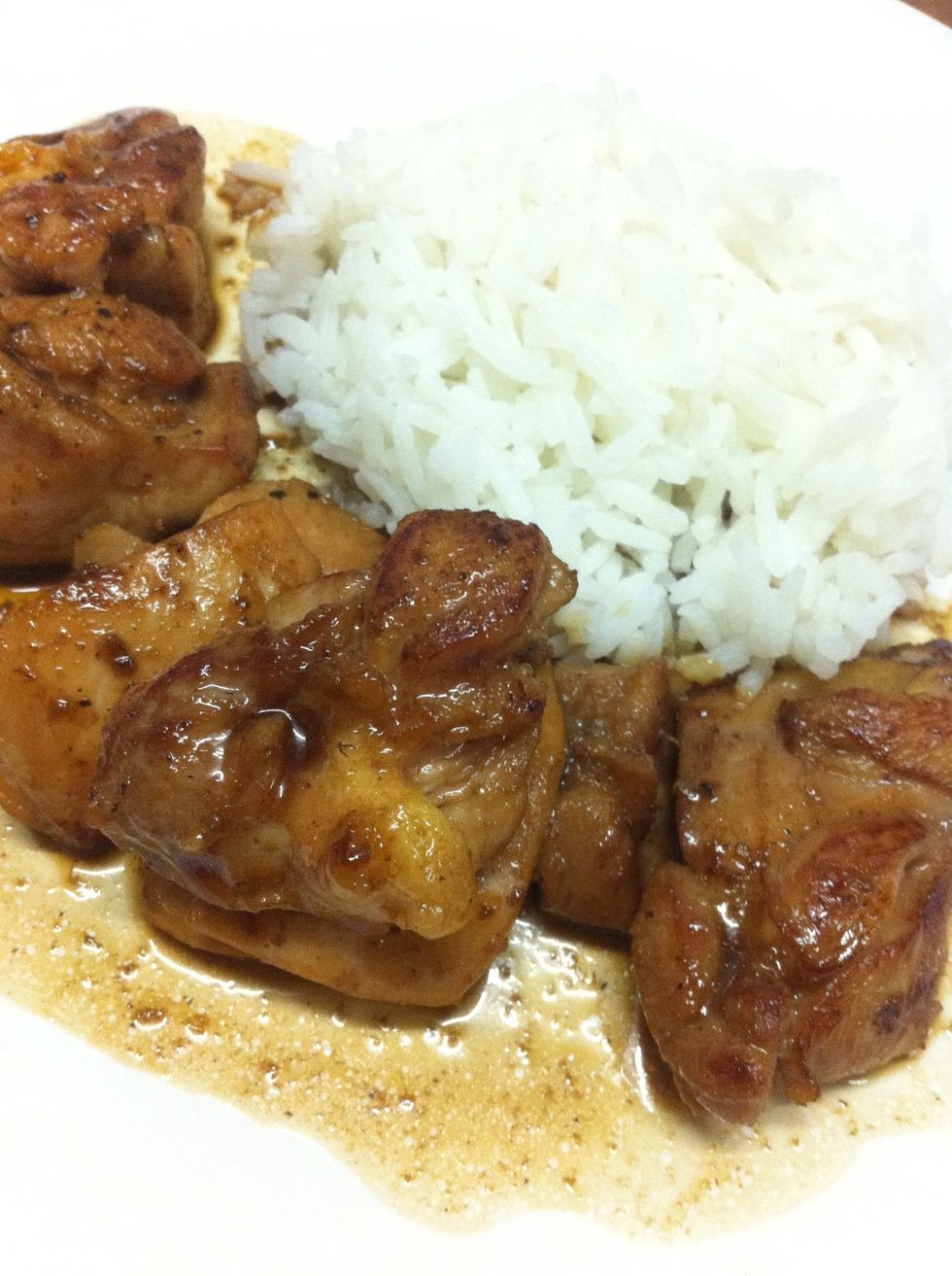 Serve the chicken with rice and pour sauce on top.\u2728