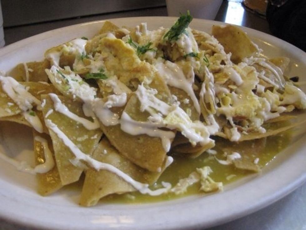 Serve the chilaquiles.