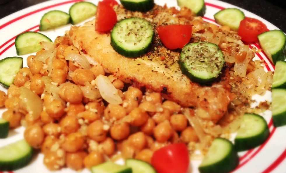 Serve the fish on top of the beans. Garnish with the fresh parsley/basil. (I realized I didn't have any, but I did have some grape tomatoes and cucumbers I needed to get rid of!).