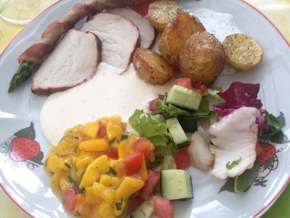 Serve the meat to roasted potatoes - we have made this dish several times and this photo is sliced flare meat and not pork tenderloin - and a fresh salsa, like this one: