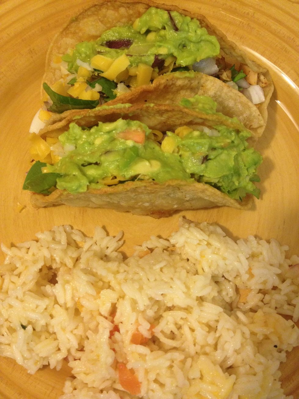 serve two tacos with a scoop of rice...