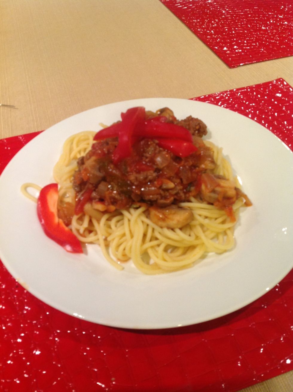 Serve with spaghetti or any other pasta and garnish with capsicum, parsley or Parmesan cheese. Enjoy! ;)
