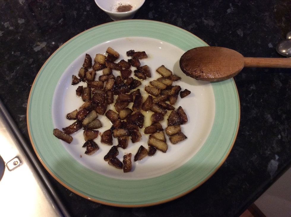 Set apples aside on a plate to cool.