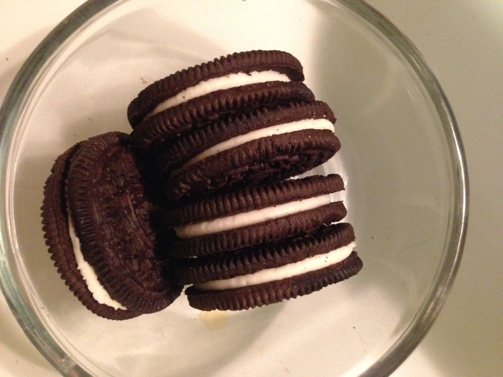 Set aside 4-5 Oreos. These will be topping later. Make sure you're using regular Oreos and not double stuf. Crush these like the others but keep separate.