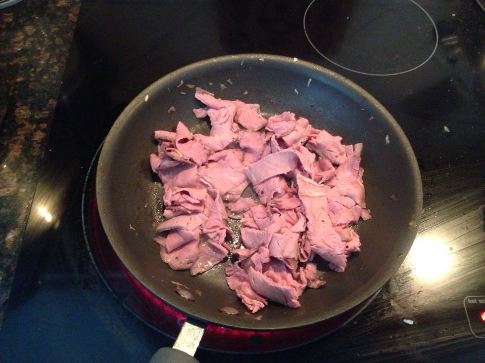 Set aside the mushrooms & onions and in the same pan, heat the beef just for a quick moment to warm.