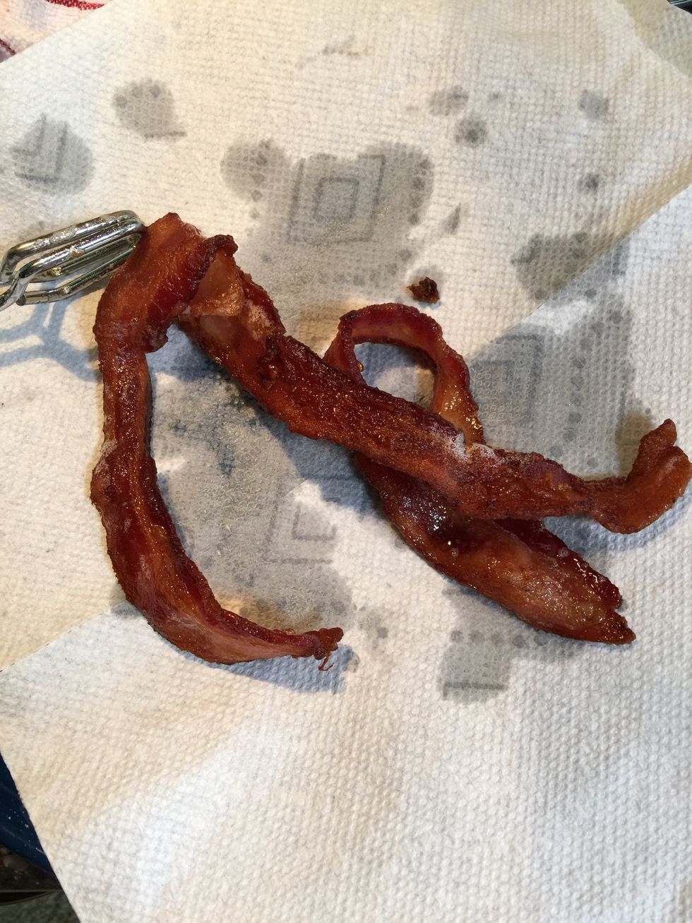Set bacon on paper towel to absorb excess grease.