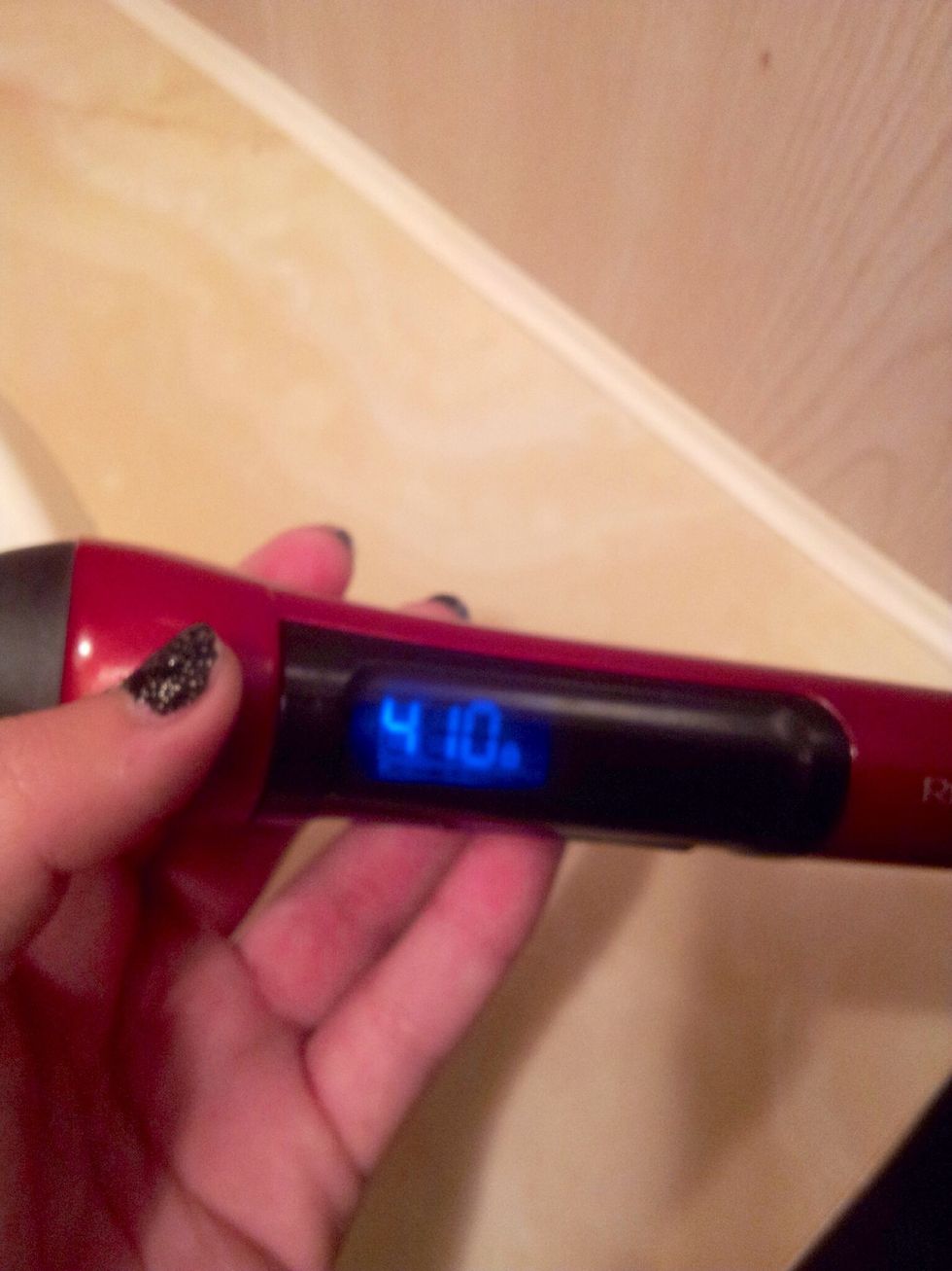 Set curling wand to desired heat suitable for your hair. If you have thin hair, consider a lower temp. I have thick hair so I turn the heat up just a little.