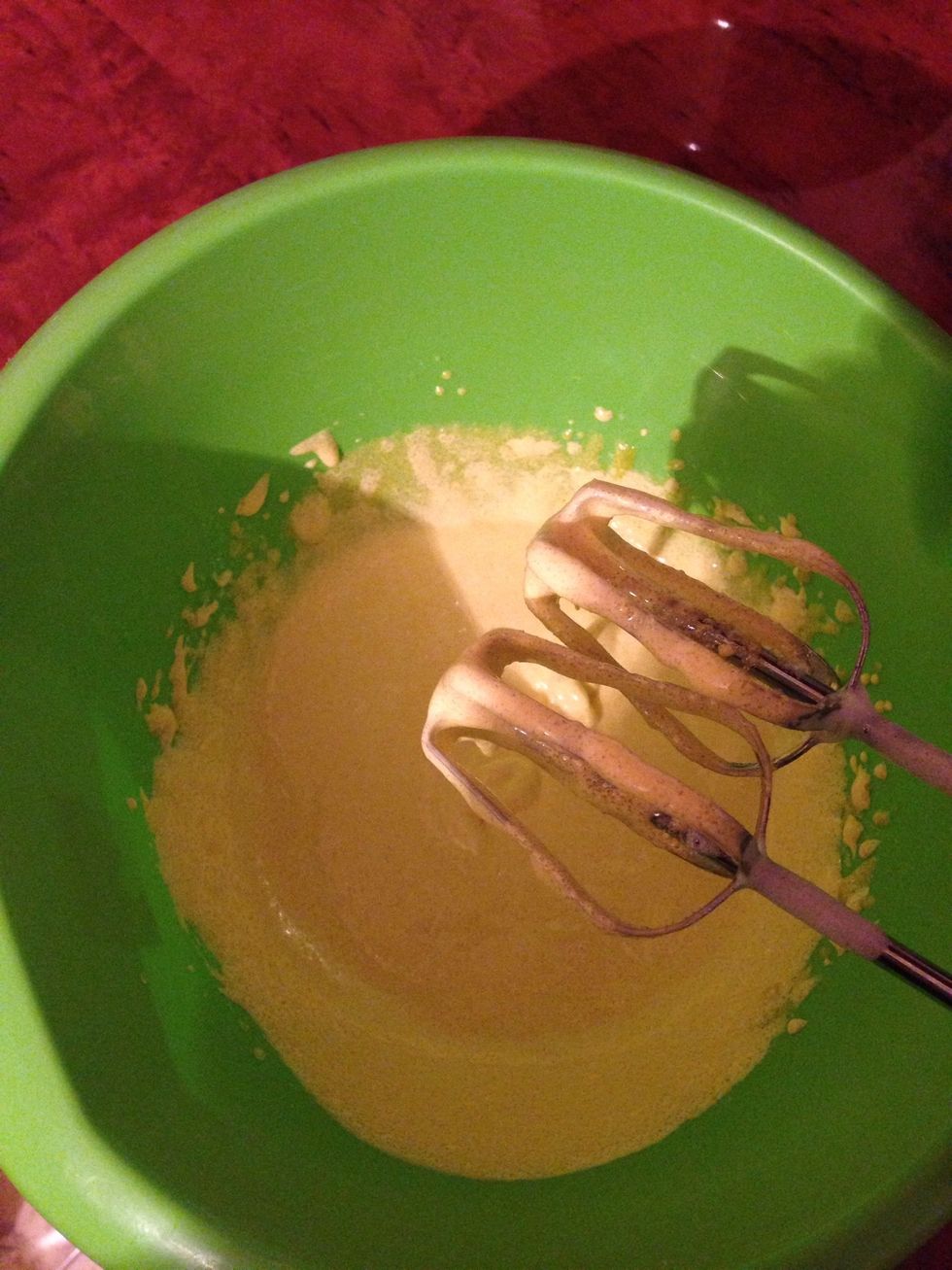 Set it aside, and mix the yolks with sugar until pale