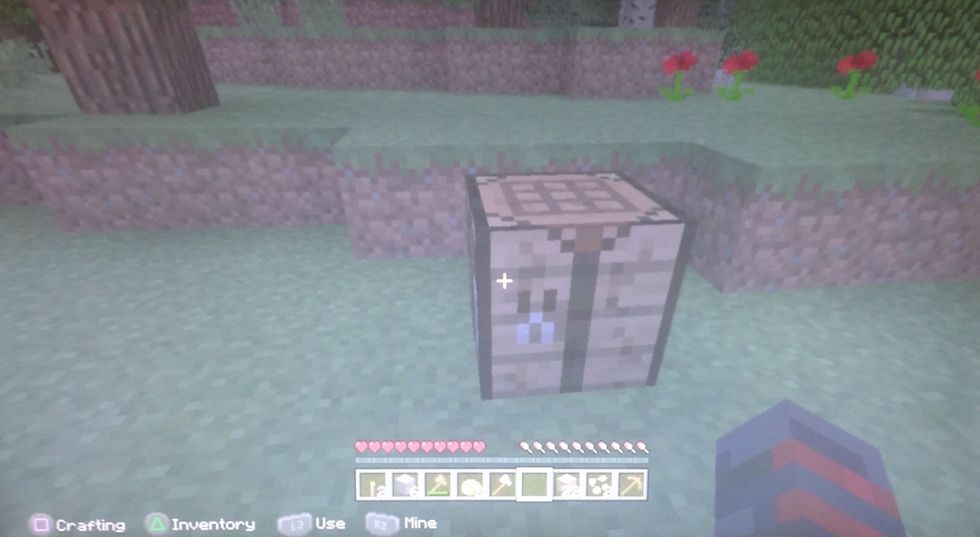 Set it down for now and create a shovel by making sticks with 2 wooden planks and 1 wooden plank.