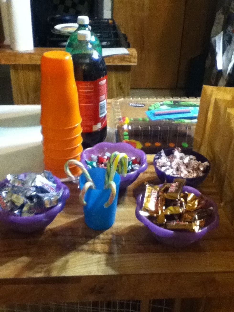 Set out candy in different size and or colored bowls