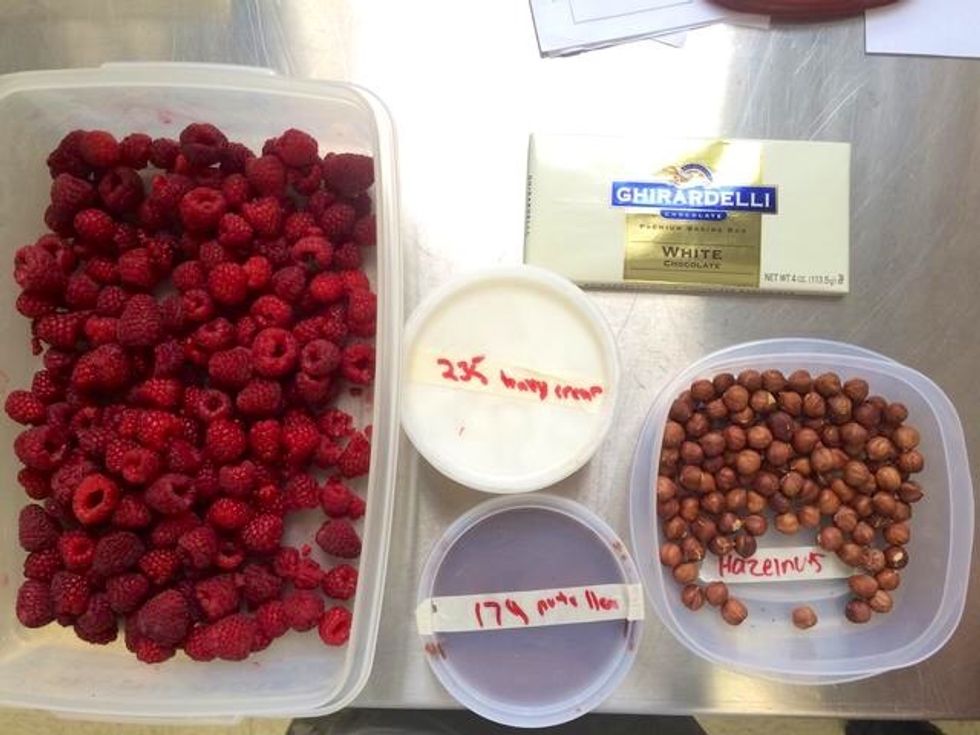 set out ingredients for sauce (Nutella, heavy cream, pinch of salt) and raw garnishes (berries, chocolate, and hazelnuts)