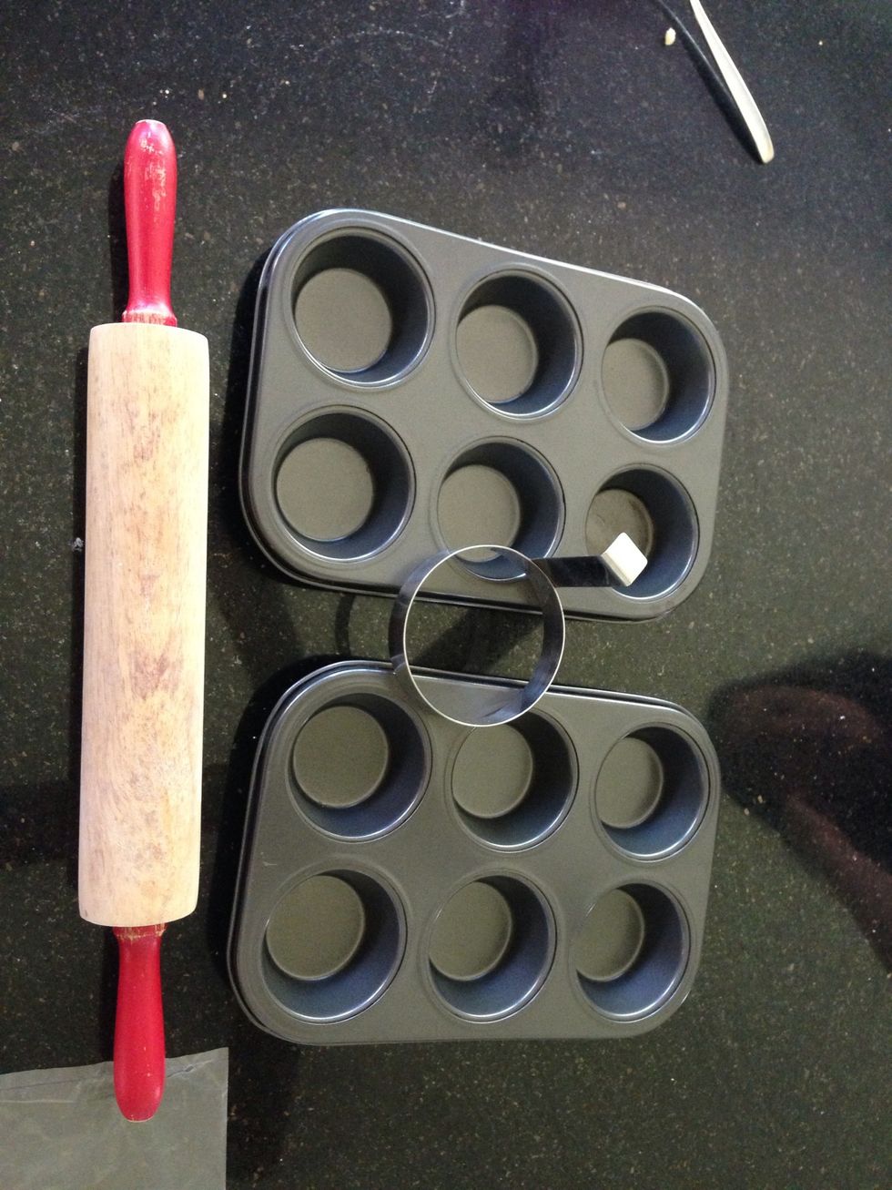 Set out your muffin trays, a cookie cutter (a plastic cup will work fine too) and a rolling pin