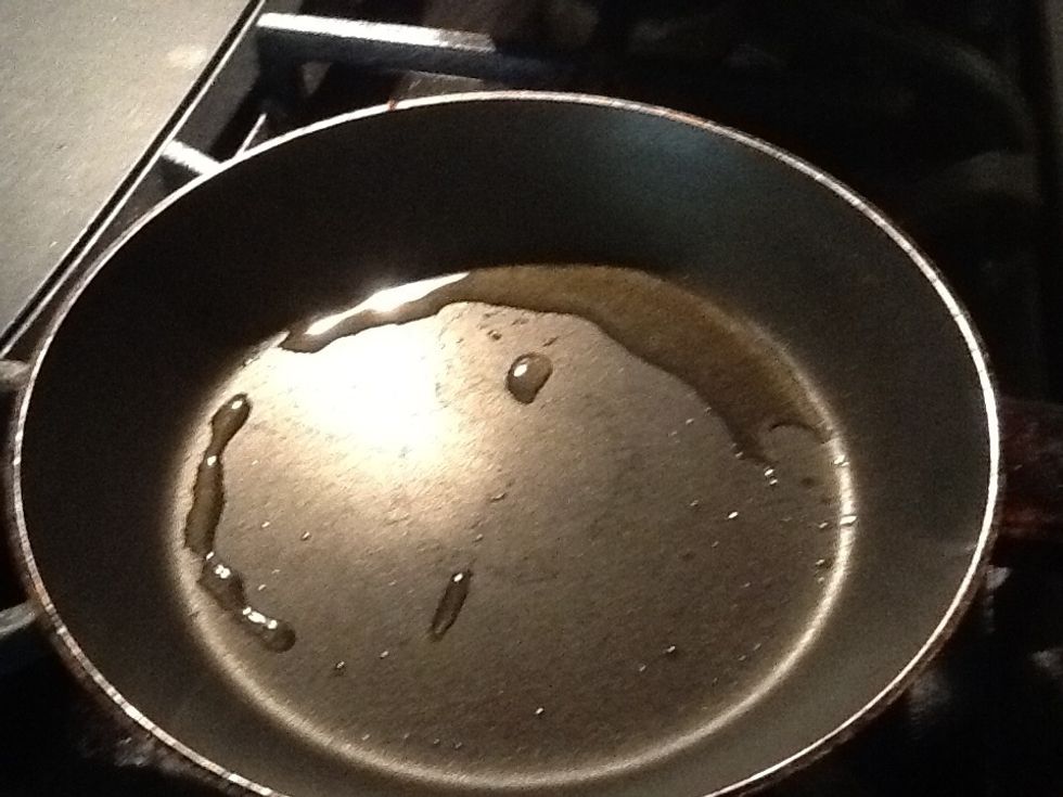 Set pan on medium heat and pour in a few teaspoons of olive oil.