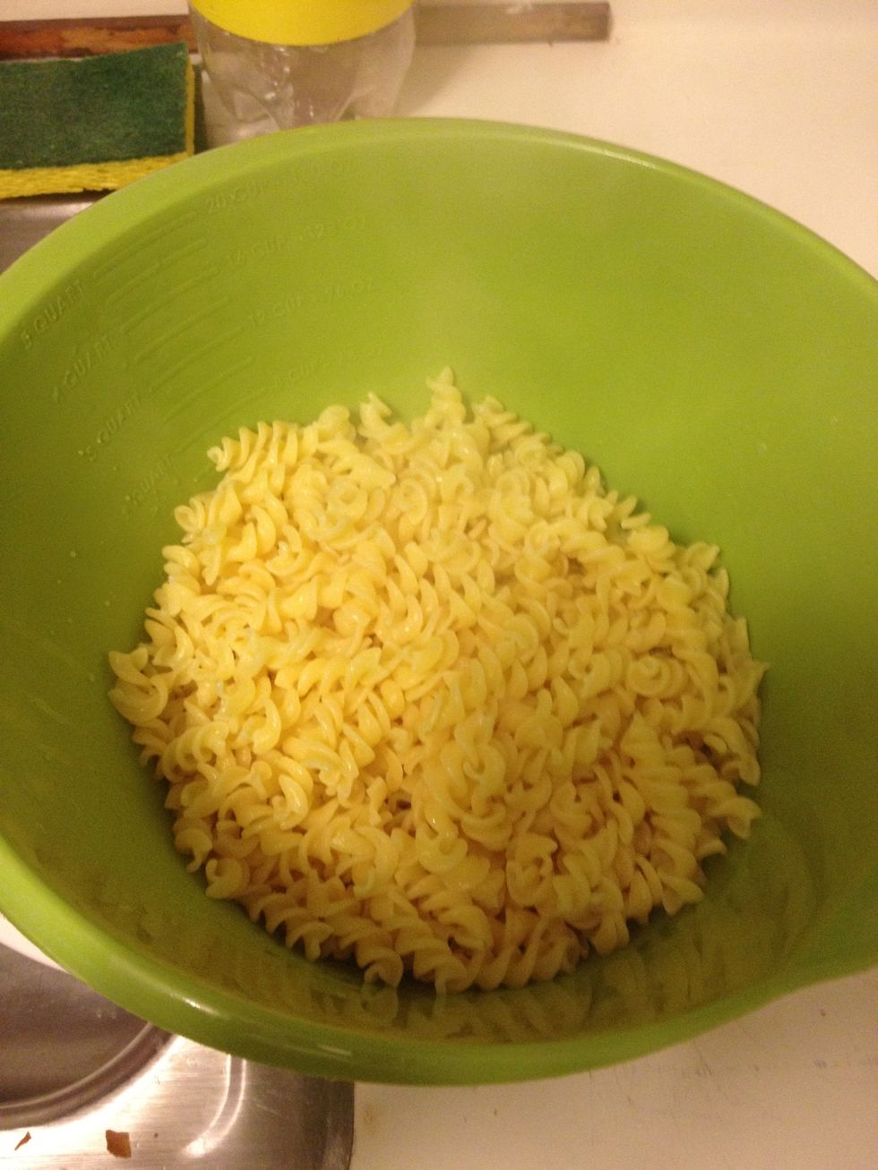 Set pasta aside. You don't have to worry about clumping , that's what the olive oil was for.