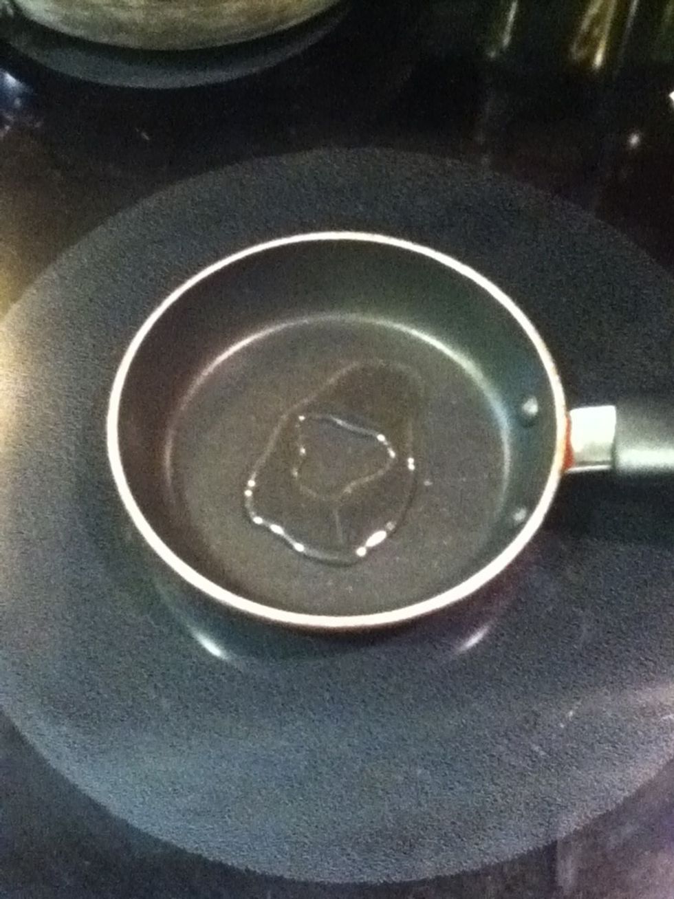 Set stove to medium heat and add oil