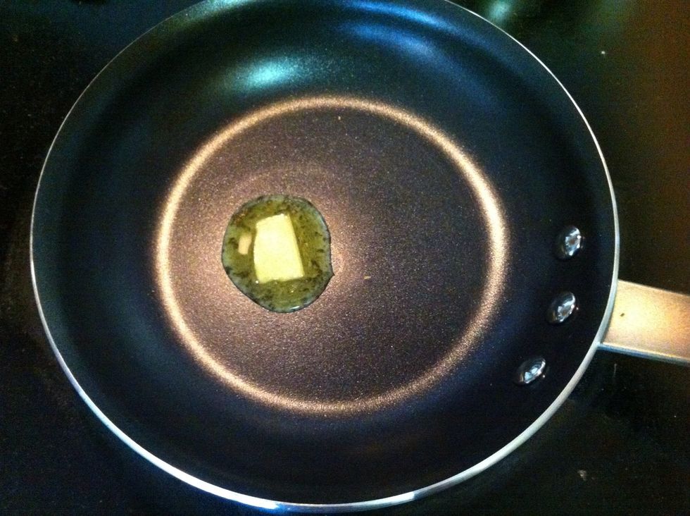 Set stove to medium heat and melt butter on a small 8-in pan. A larger pan will work fine as well, but the smaller pan makes the critical egg flip easier.