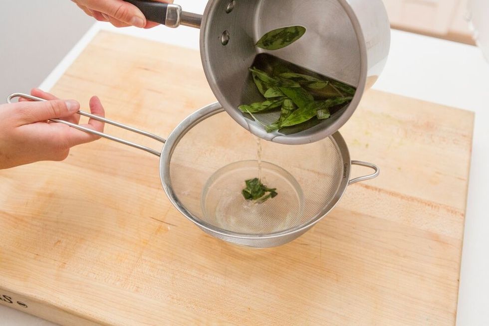 Set syrup mixture aside for 15 minutes to let sage mixture infuse. Then, use a sieve to remove the herbs. Set aside.