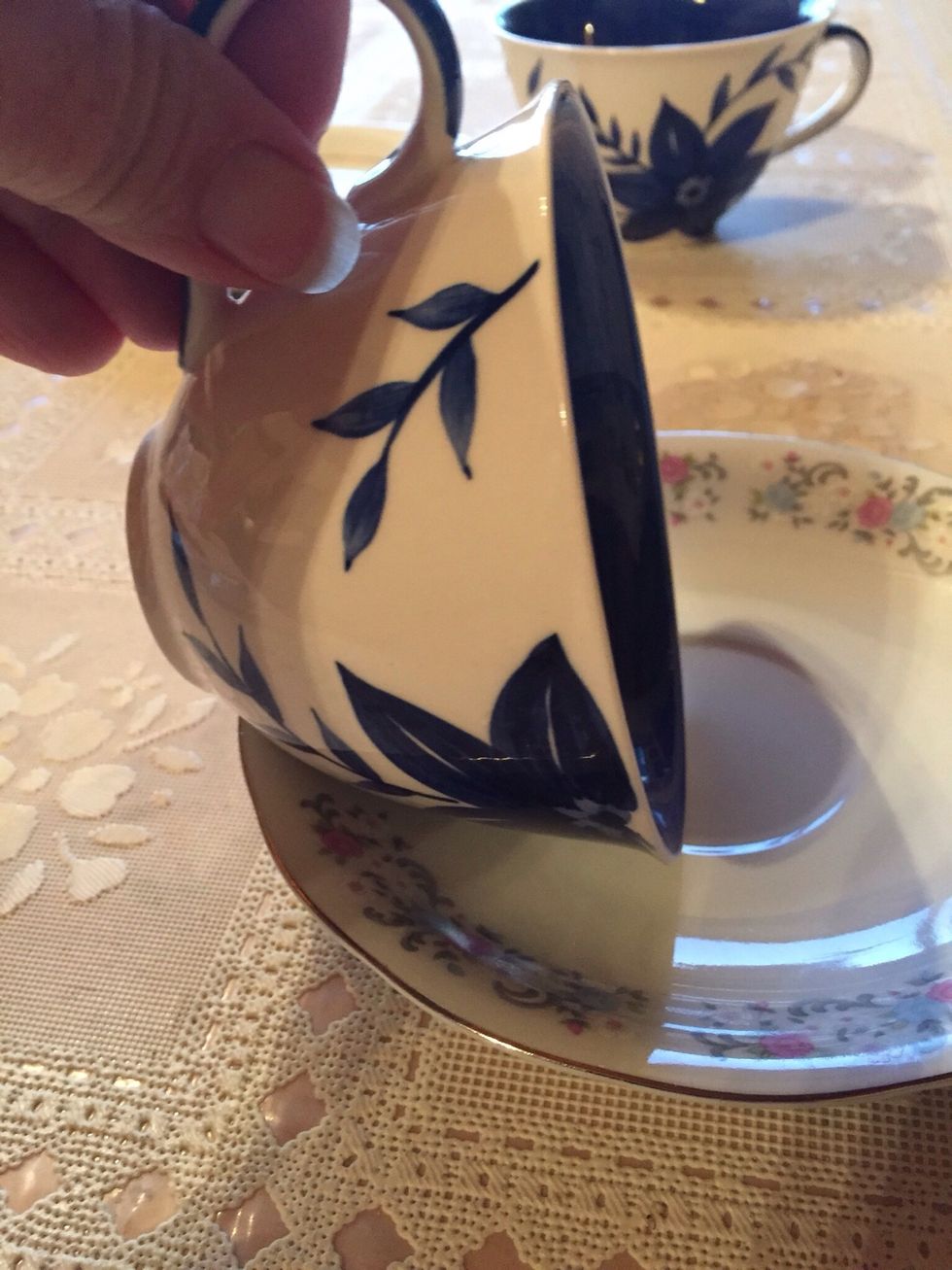 Set tea cup or mug in glue.