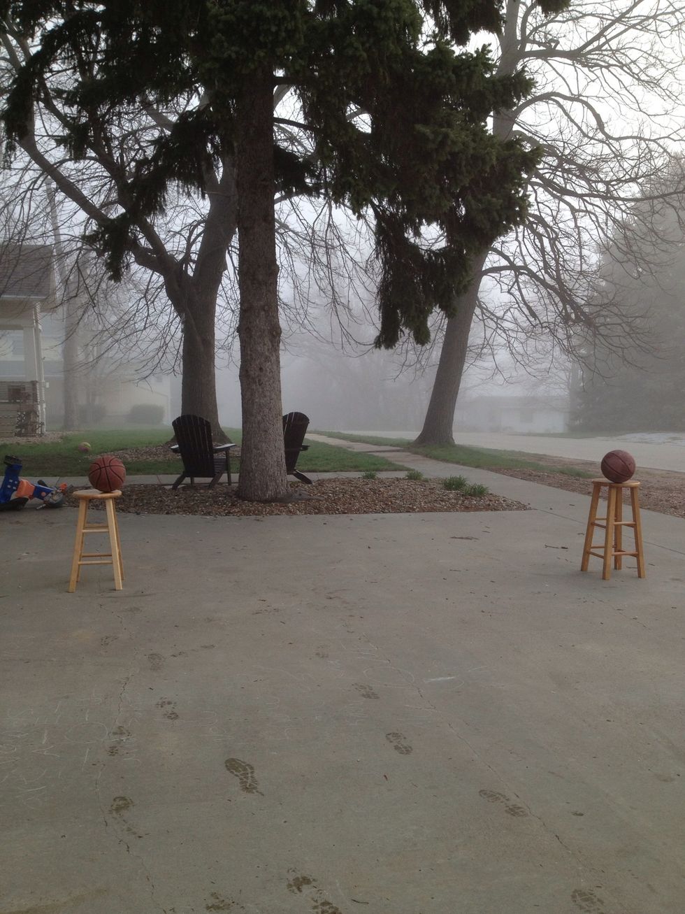 Set the balls on the stools.