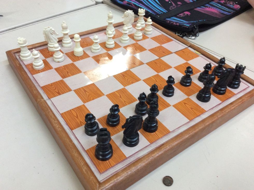 Set the bishops next to the knights.