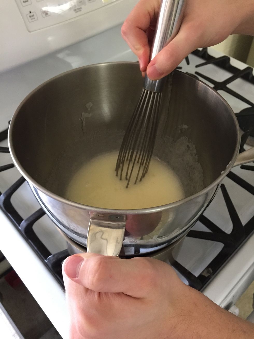 Set the bowl over a pan of simmering water, and cook, whisking constantly, until the sugar is completely dissolved and the mixture registers 140 degrees F (about 6-8 minutes)