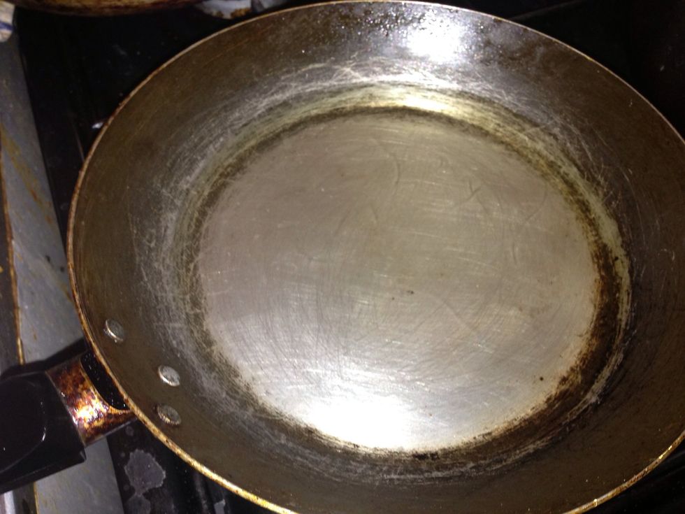 Set the cooker to high heat, put in your oil