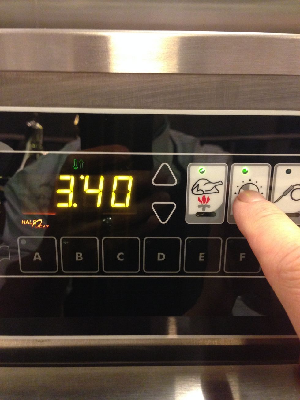 Set the cooking time. For 39 ribs: 3 hrs 40 min. 26 ribs: 3 hrs 10 min. 13 ribs: 2 hrs 40 min. by pressing the timer button (the one with the clock on it) and adjusting with the up and down arrows.