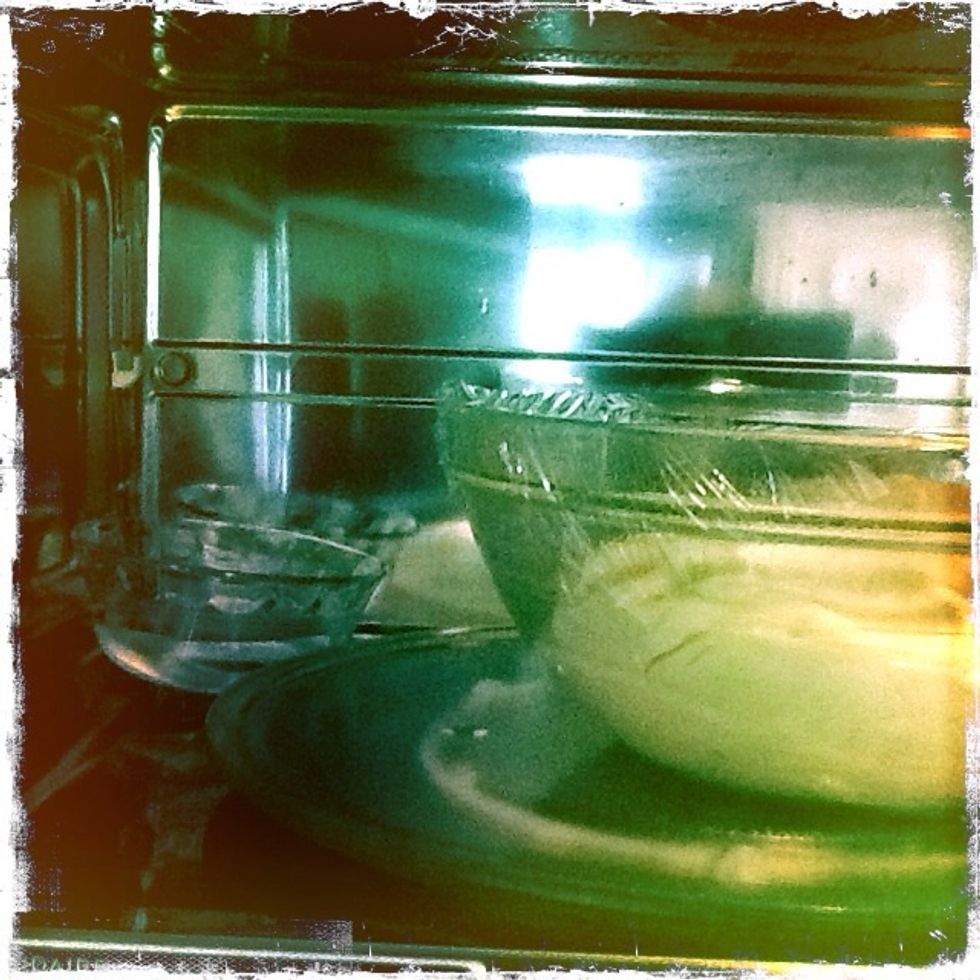 Set the hot water off to the side and add the dough to the "proof box" keep the door closed.