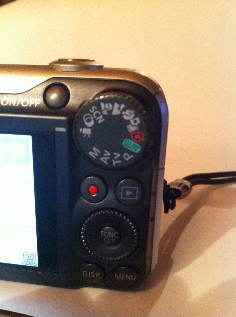 Set the mode dial as shown.