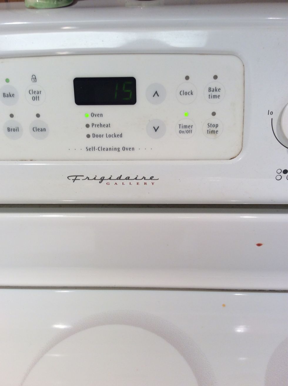 Set the oven timer for 15 minutes.