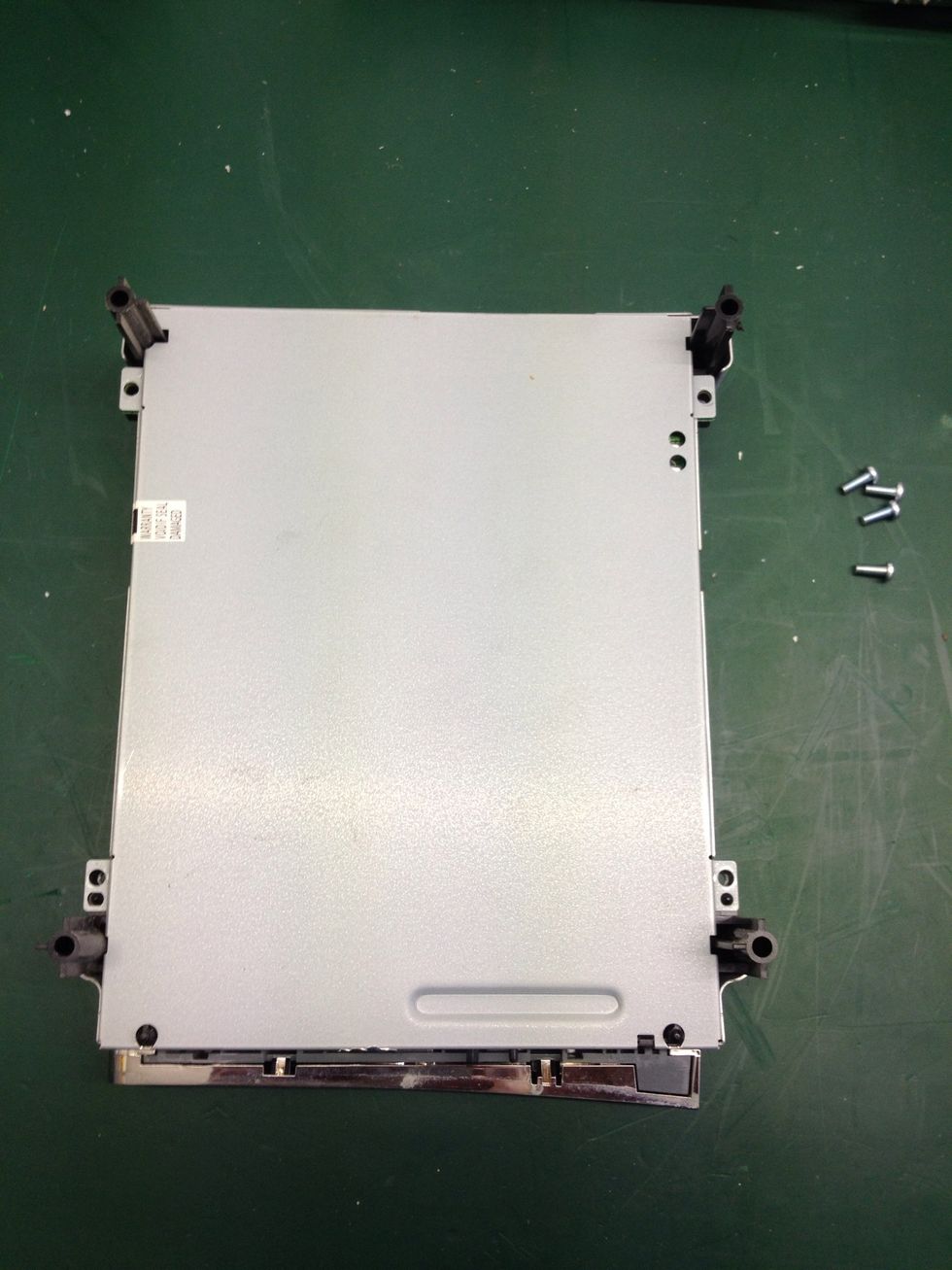 Set the screws safely aside.