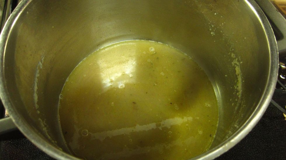 Set the stove top pan on medium heat and add the fish oil water from the can and heat for 2 minutes. Why waste all the good juices from the fish can right?