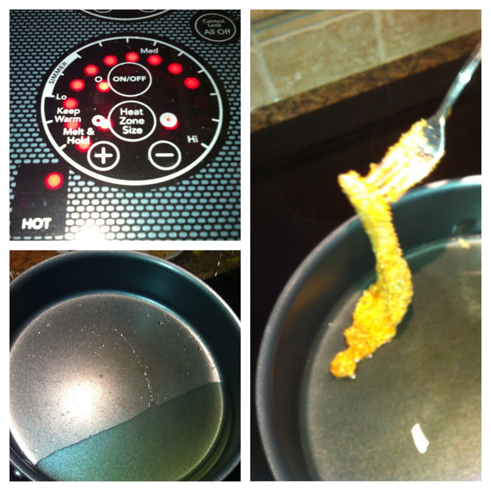 Set the temperature to medium high. Pour enough oil in the frying pan to ensure half of the chicken is swimming in it. When the oil is hot, place the chicken in the pan.