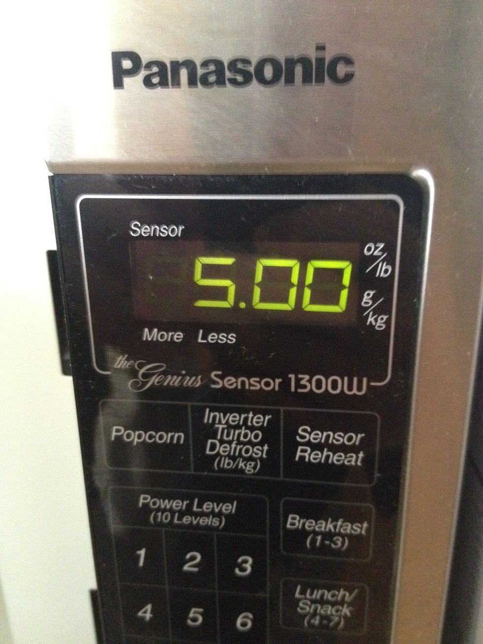 Set the timer for 5 minutes even if that feels like too long. Then watch it pop and get involved if a bag rotation or assist looks required. The goal is an even pop - black popcorn is the enemy.