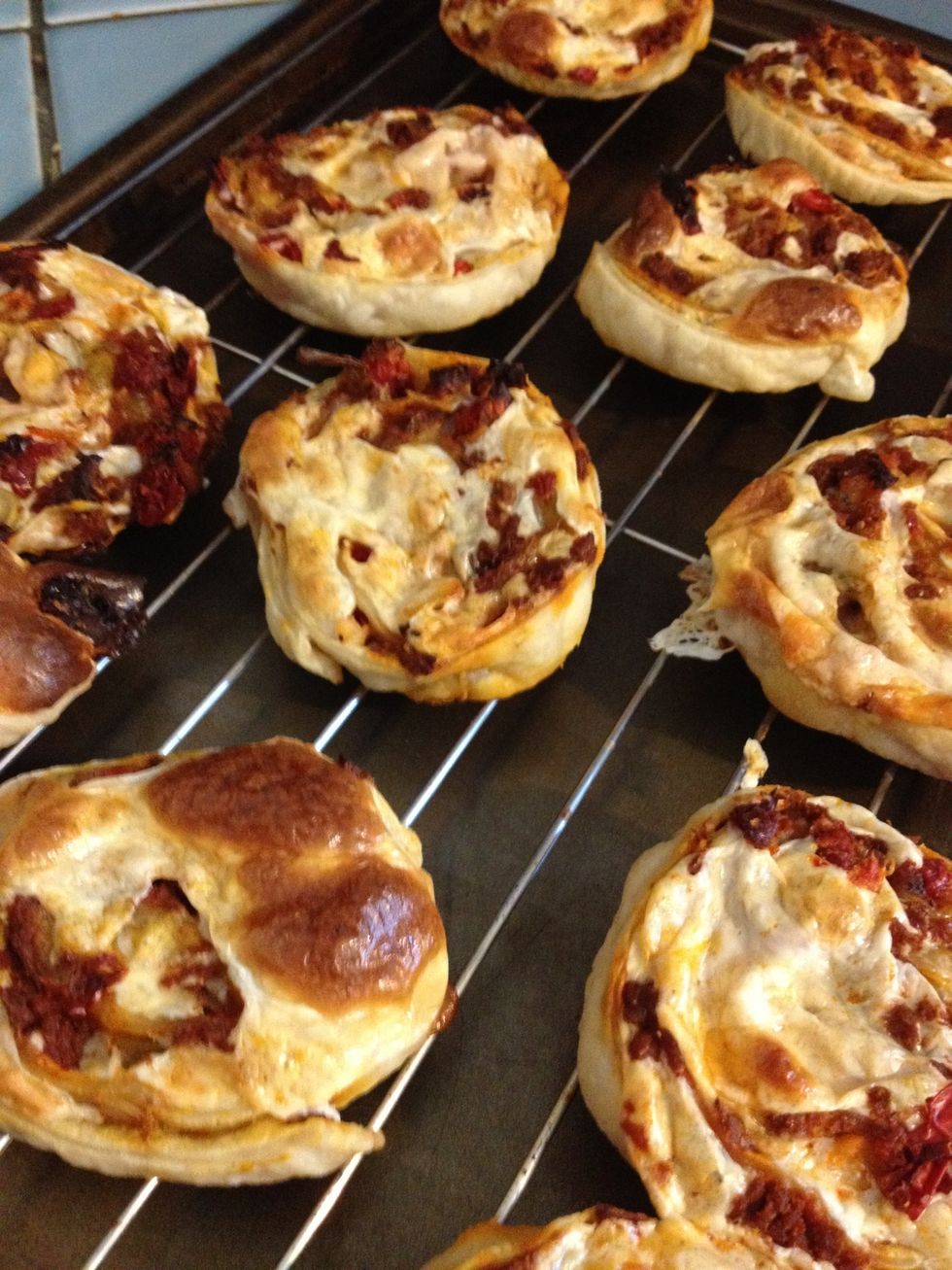 Set these "pinwheels" on a rack to cool though they are especially yummy served warm. Be sure to sample one before serving them to others \ud83d\ude1c!