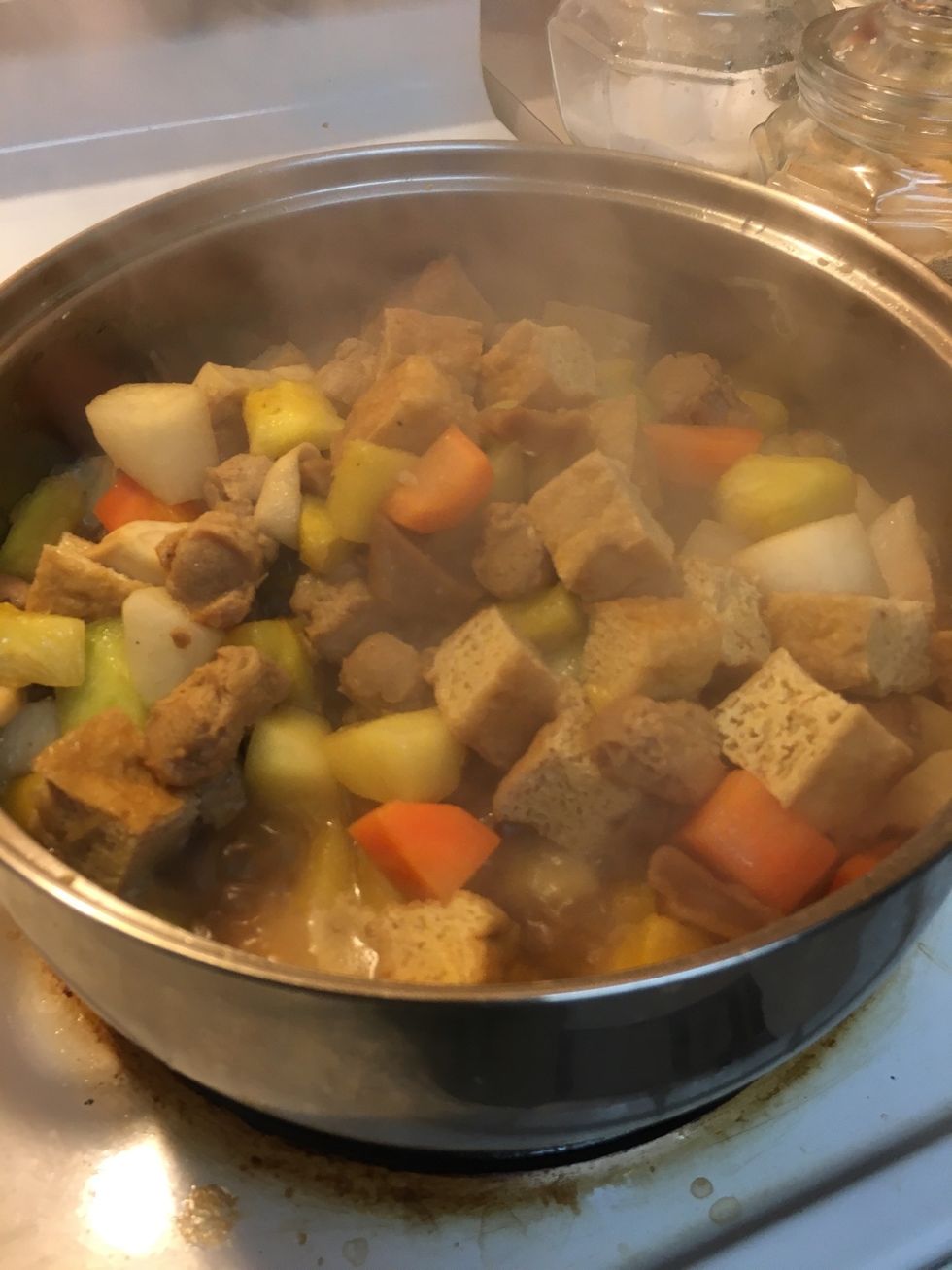 Set to high heat for a few minutes to let the ingredients marinated, then lower to medium heat to shimmer