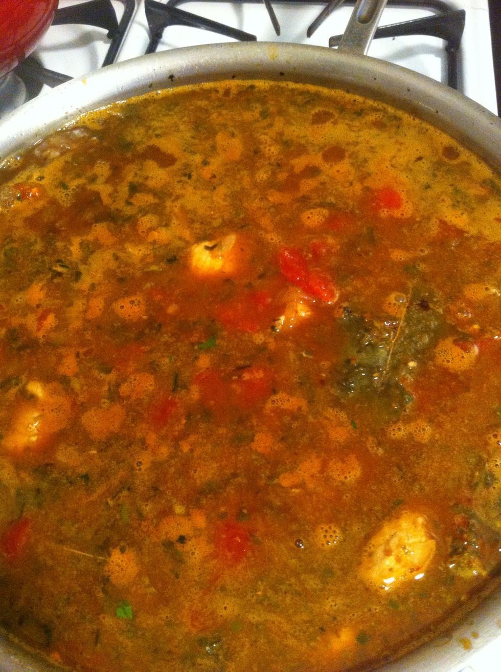 Set to high heat. Get it boilin' then bring it back down to a simmer. Cover and let simmer for a good hour. The longer you simmer, the more flavorful it'll be.