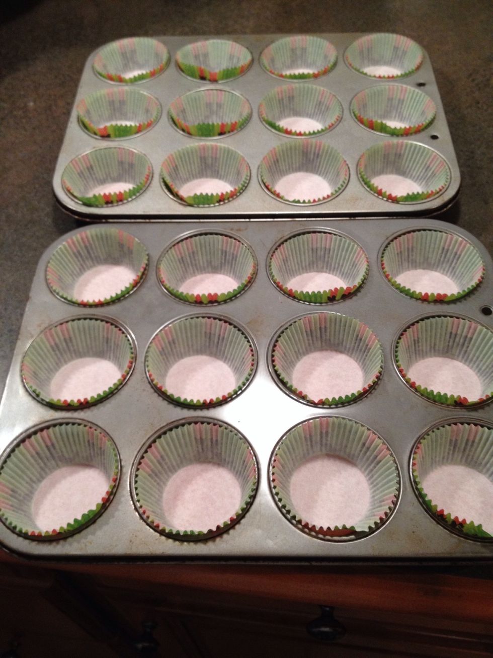 Set up 24 muffin wrappers.