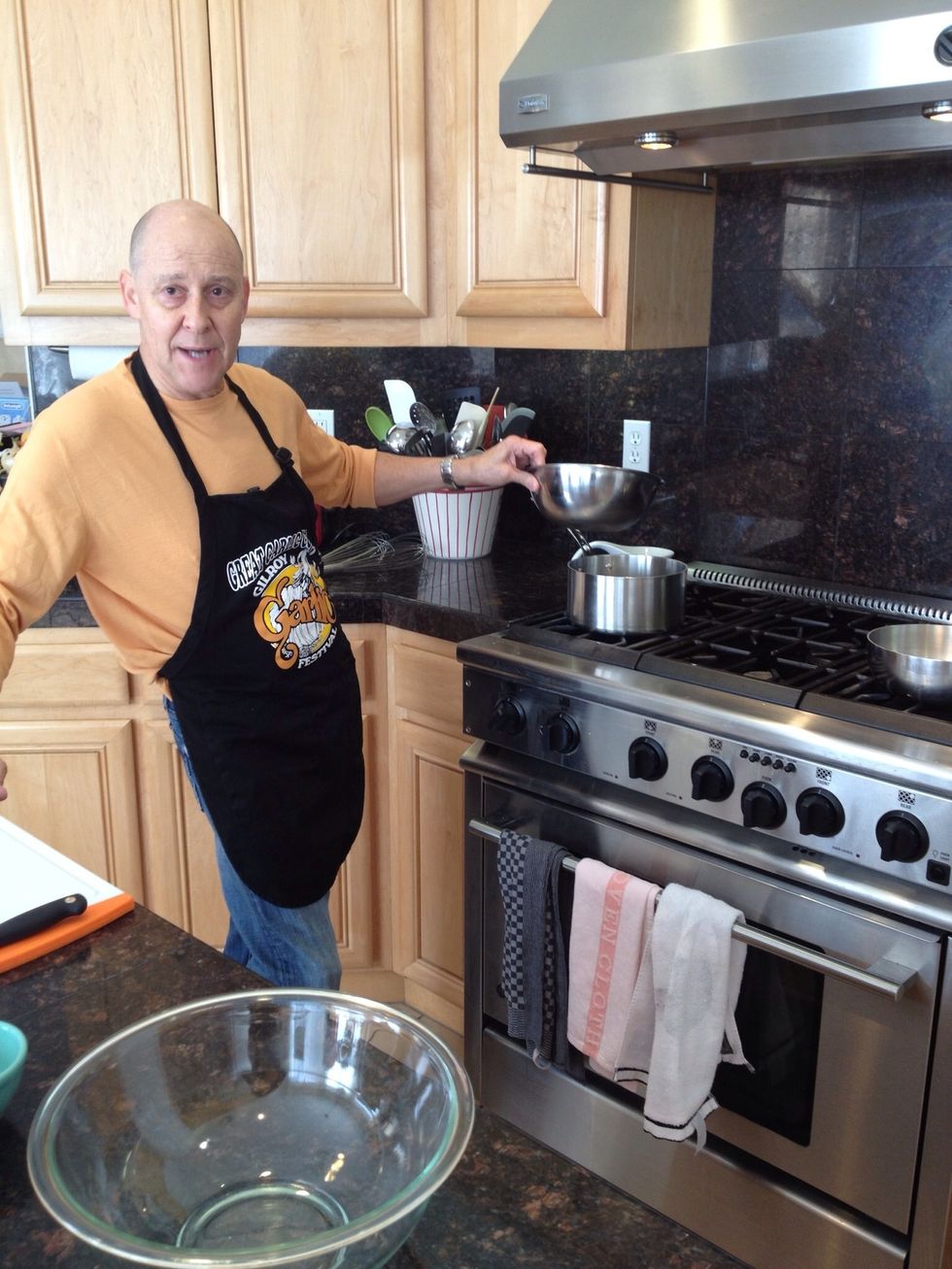 Set up a double boiler by placing a bowl on top of a pot of water.