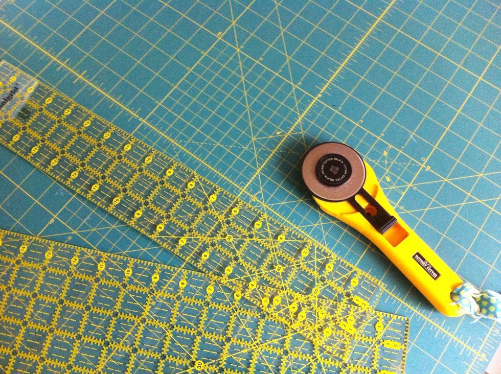 Set up a rotary cutting station. You will need a rotary cutting mat, a rotary cutting tool (be sure blade is sharp and in good condition), and a rotary cutting ruler.