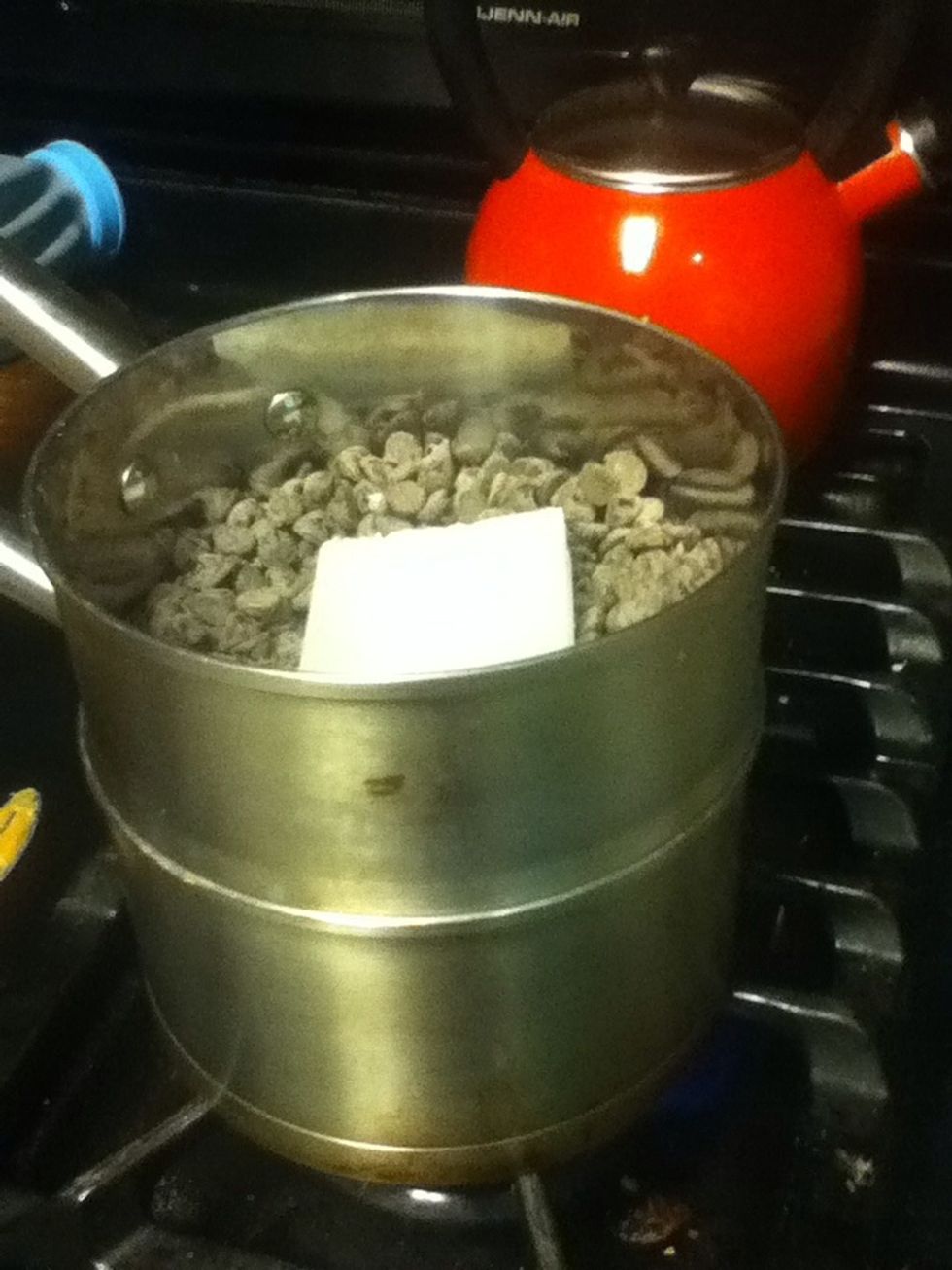 Set up double boiler with the wax and chocolate.